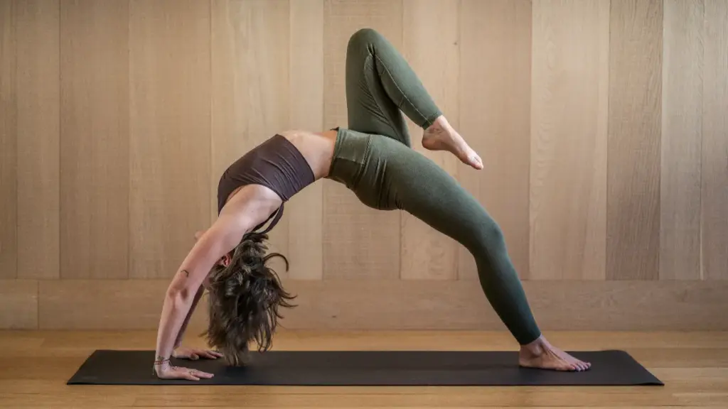 a woman is doing yoga