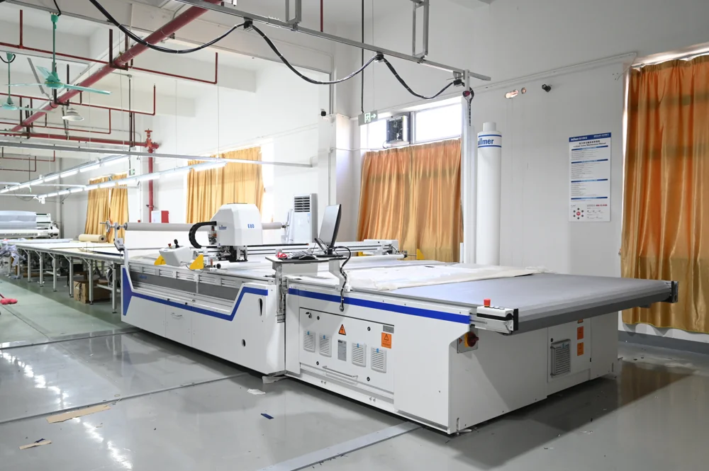 Automatic cutting table in the ASG Fashions cutting room